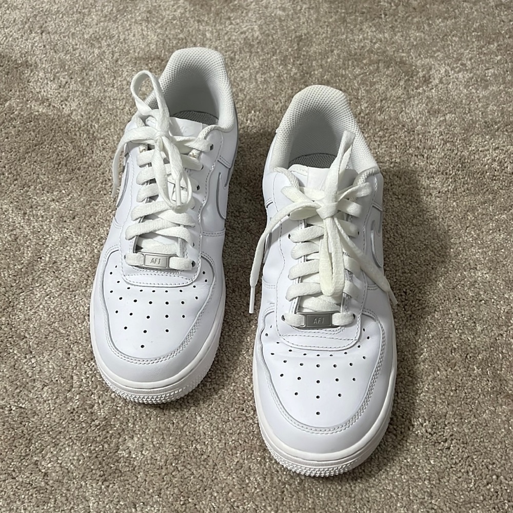 Woman’s all white Air Force ones